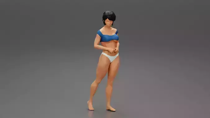 Beautiful young slim girl wearing bikini standing