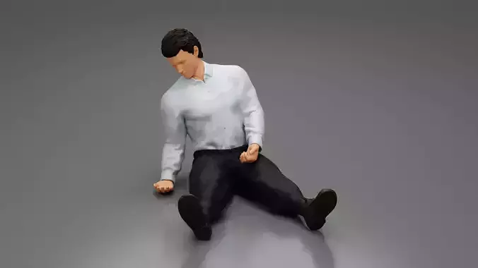 Accident of a male worker sitting on the floor with an injured