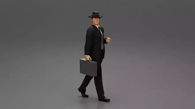 Businessman Walking and Holding His Briefcase