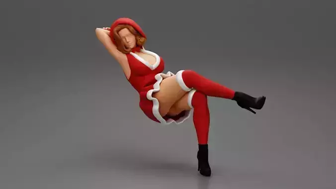 Santa Female sitting in vintage chair in hat