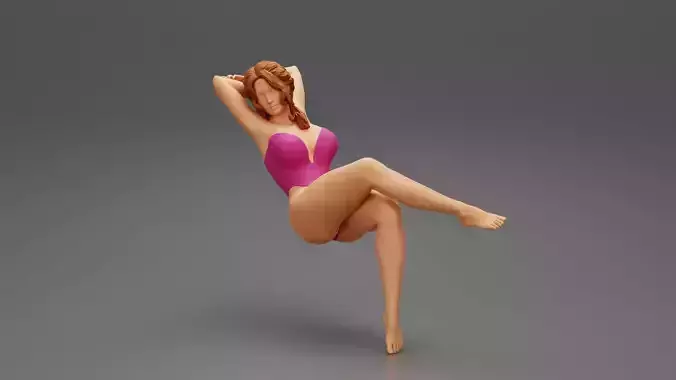 sexy girl sitting on a chair with hands in hair