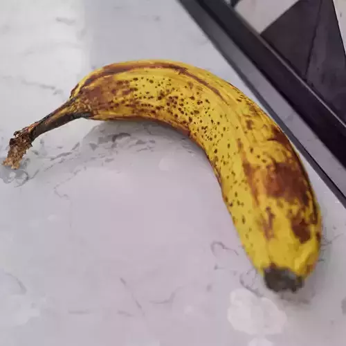 ripe banana beginning to turn old and squashy - photoscan