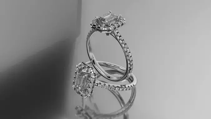 Cathedral Ring with Emerald cut stone in Halo