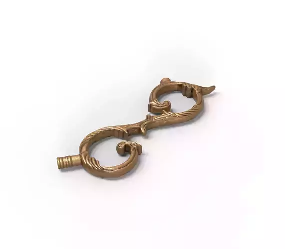 carving ornate brass key