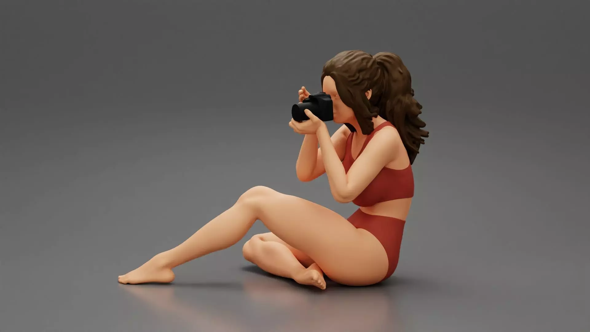 Woman photographer in sitting and holding a camera 3D print model