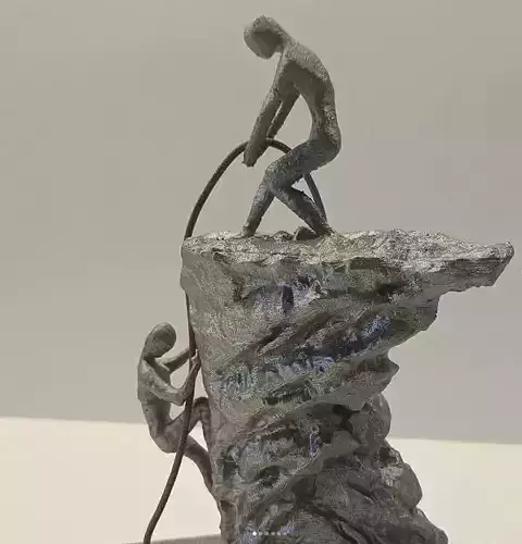 Man helping man sculpture for home decoration