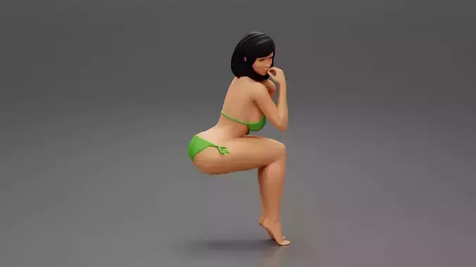 Sexy girl in bikini sitting