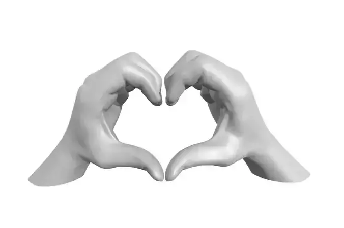 Hands in the shape of a heart with pedestal