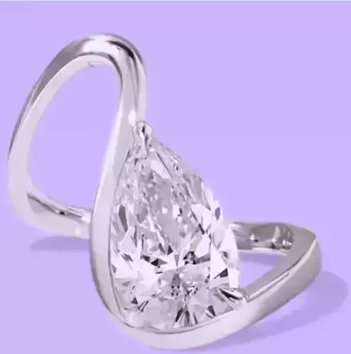 Wave shaped ring with Pear shape stone