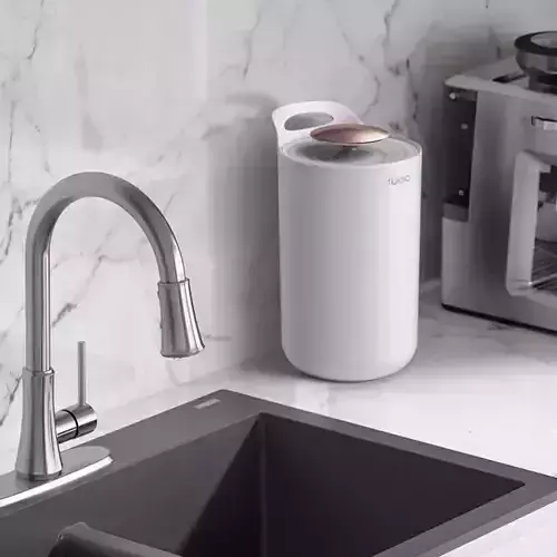 Fludic vacuum food waste bin