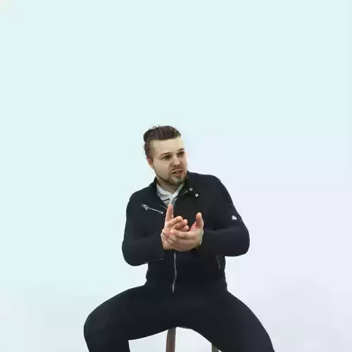 Keen 09B Explaining Casual Sitting Man