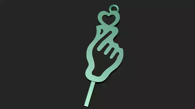 Gold heart pendant in hand