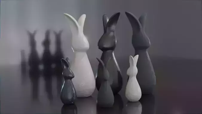 Three  pairs figurines of rabbits large and small for decoration
