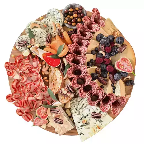 Meat platter with pieces of cheese