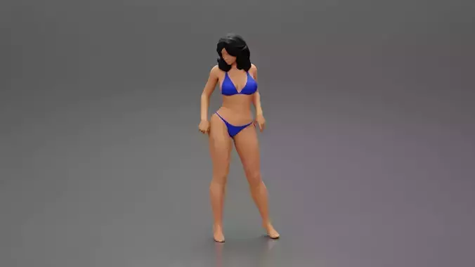 sexy girl in bikini posing standing on the beach