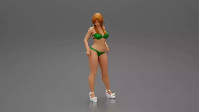 sexy girl in bikini and heels posing standing on the beach