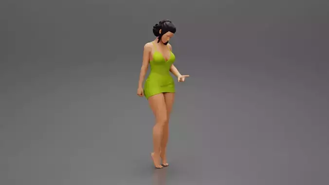 Sexy Girl standing in mini dress on the beach