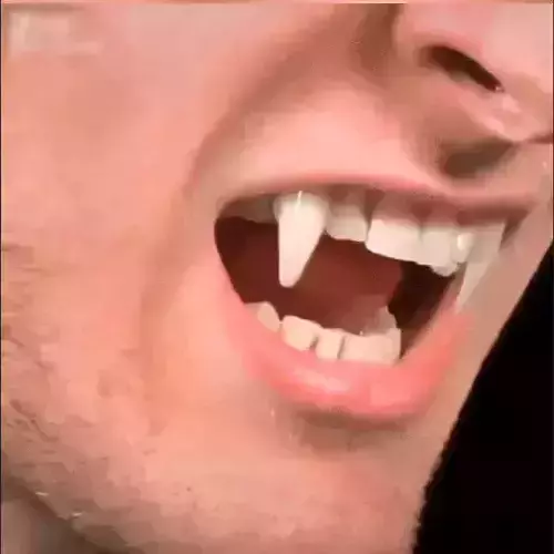 RETRACTABLE VAMPIRE FANG 3D model