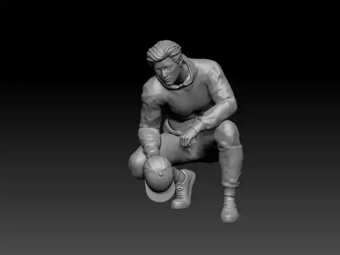 man sitting bring snapback