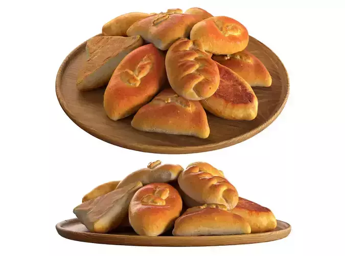 Baked pies on a wooden plate