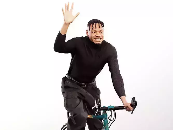 Blake 12250 - Young Black Man Riding Bike Waving