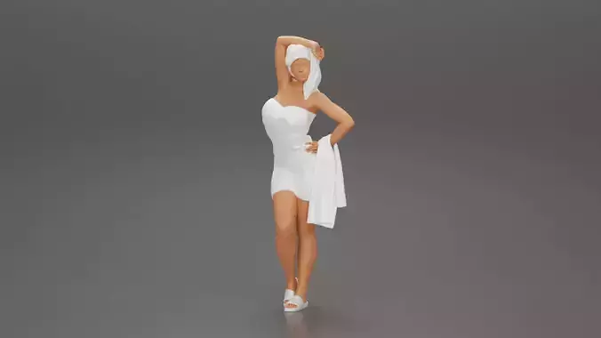 Sexy woman after shower wearing bathrobe holding bath towel