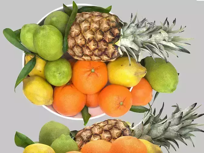 bowl of limes and pineapples fruit