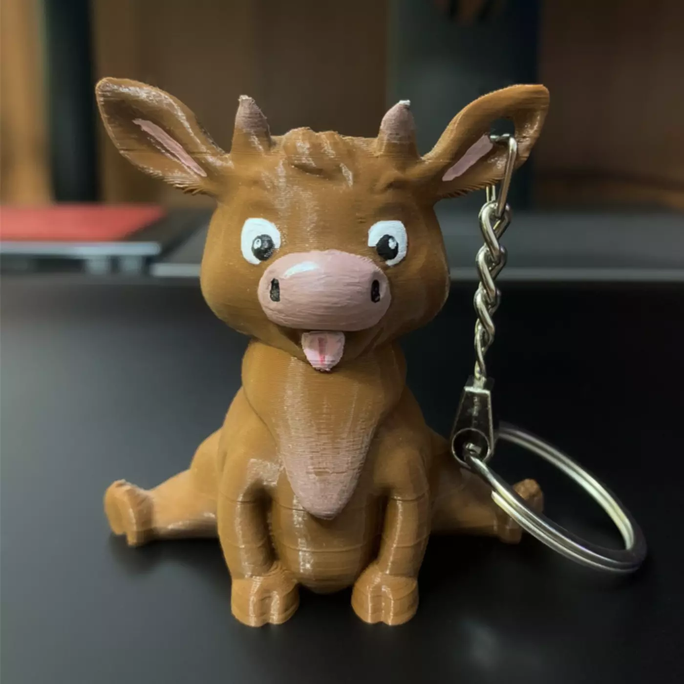 Cheerful cow keychain 3D print model