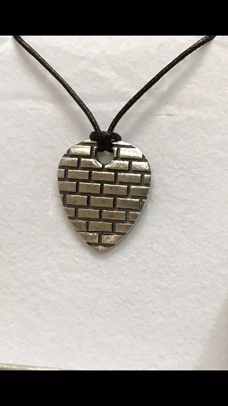 3D printable guitar pick with Pink Floyd The Wall engraved model 3D print model_0