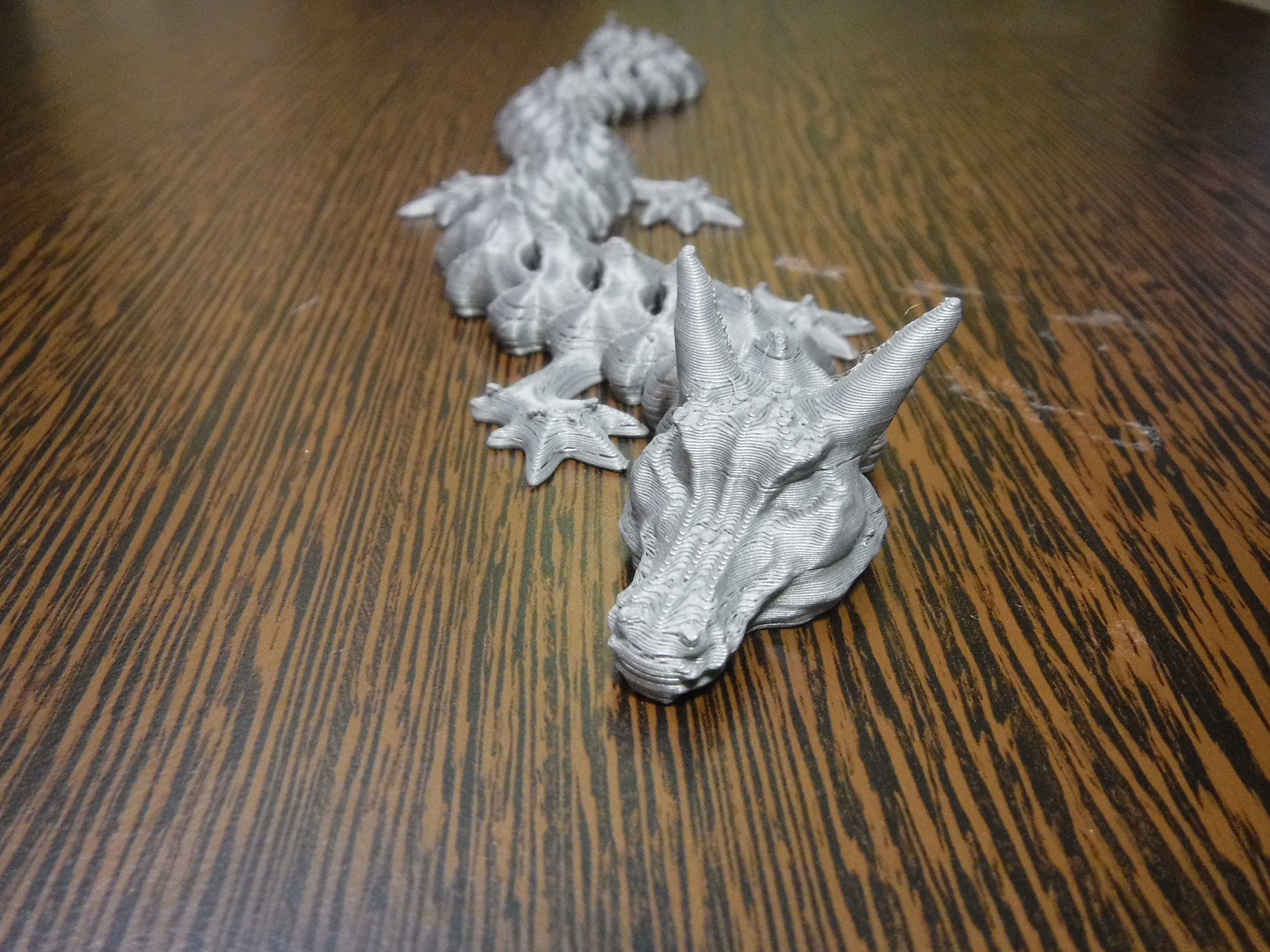 Articulated flexi dragon fidget toy 3D print model_3