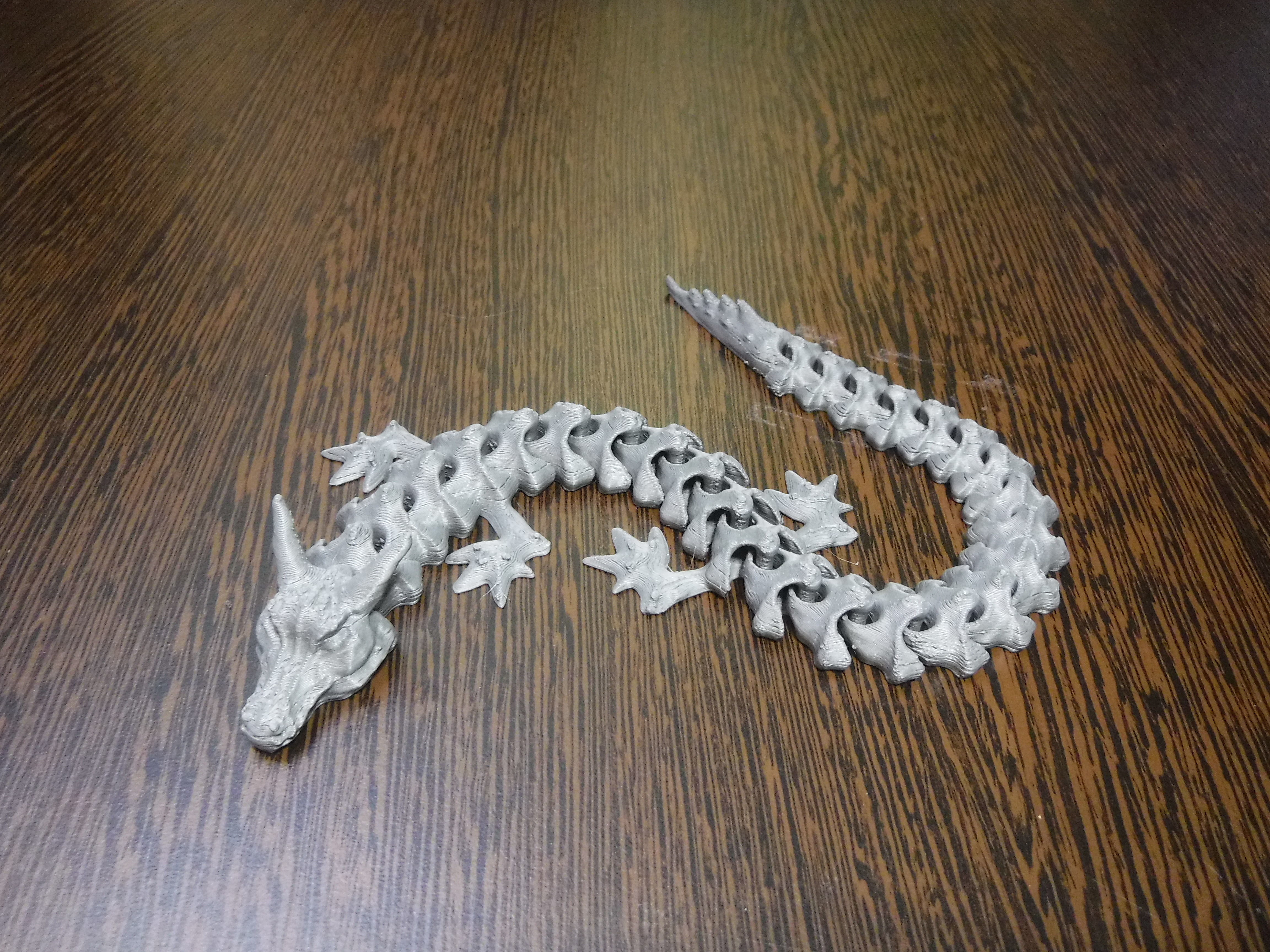 Articulated flexi dragon fidget toy 3D print model_2