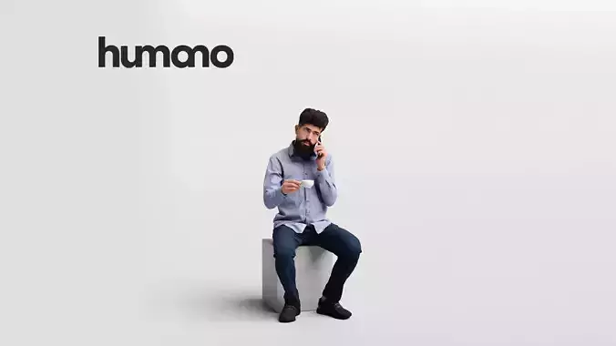 Humano man sitting and drinking coffee - office cafe -06814-15