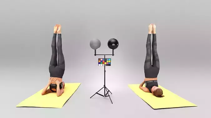 Female standing on her head and doing yoga 420