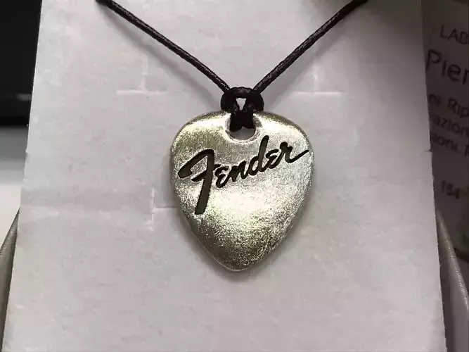 3D printable guitar pick with engraved Fender logo 3D print model