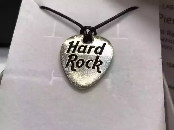 3D printable guitar pick with engraved Hard Rock Cafe logo 3D print model
