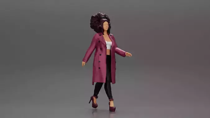 Stylish woman with curly hair in a fashion long open coat walks 