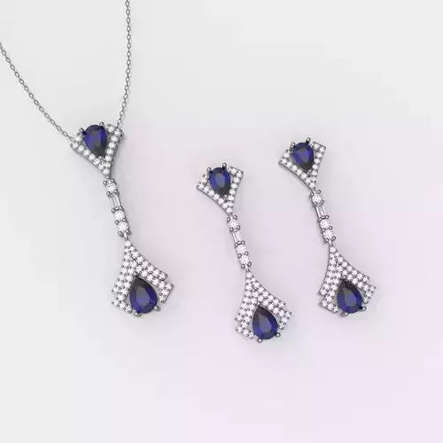 Earing and pendant set with pear and round stone