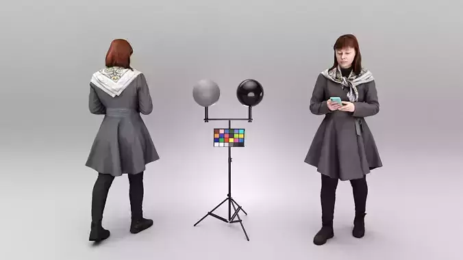 Woman in coat using smartphone 428