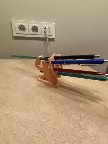 Holder for pencils man with a shield