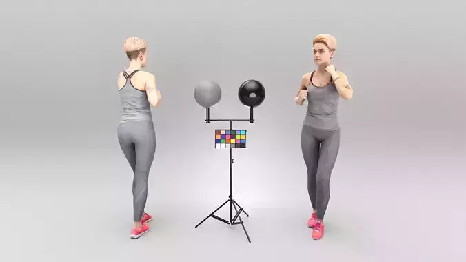 Young woman with tattoo in gray sportswear 437