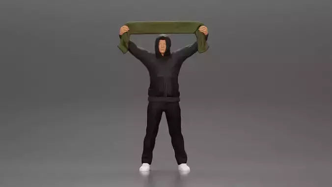 Man in a hoodie supporting and holding a scarf