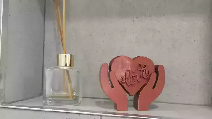 Heart tabletop figure in palm on Valentine s Day