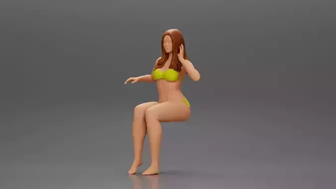 Sexy girl in a bikini sitting on a boat