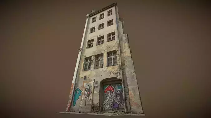 Facade of an abandoned narrow tenement house