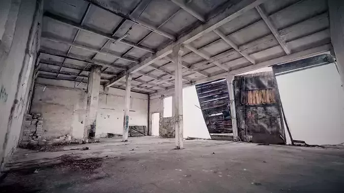 Large garage hall with damaged wooden gates
