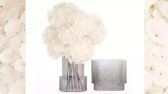 Solemn bouquet of white flowers in a vase with hydrangea 369