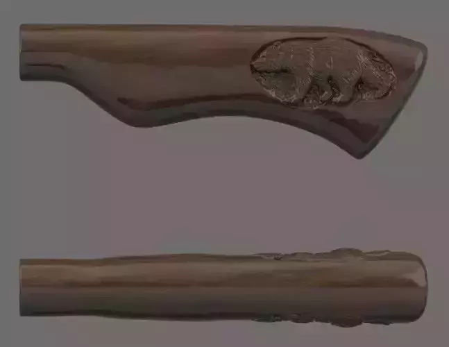 Knife handle with carved bear