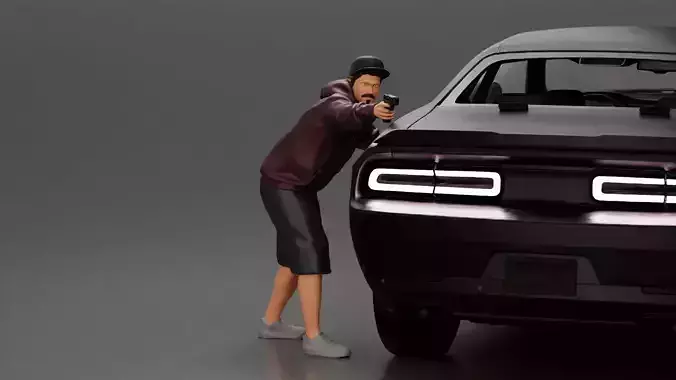 gangster man in a hoodie and cap shooting a gun behind the car