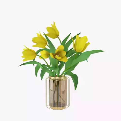 Yellow tulip flowers in a golden glass vase