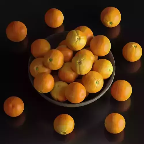 oranges in a ceramic bowl